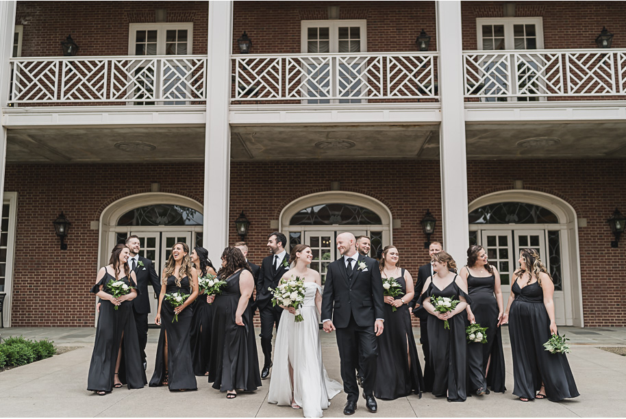 A spring black and white Lovett Hall wedding at Greenfield Village in Dearborn, Michigan provided by Kari Dawson Photography.