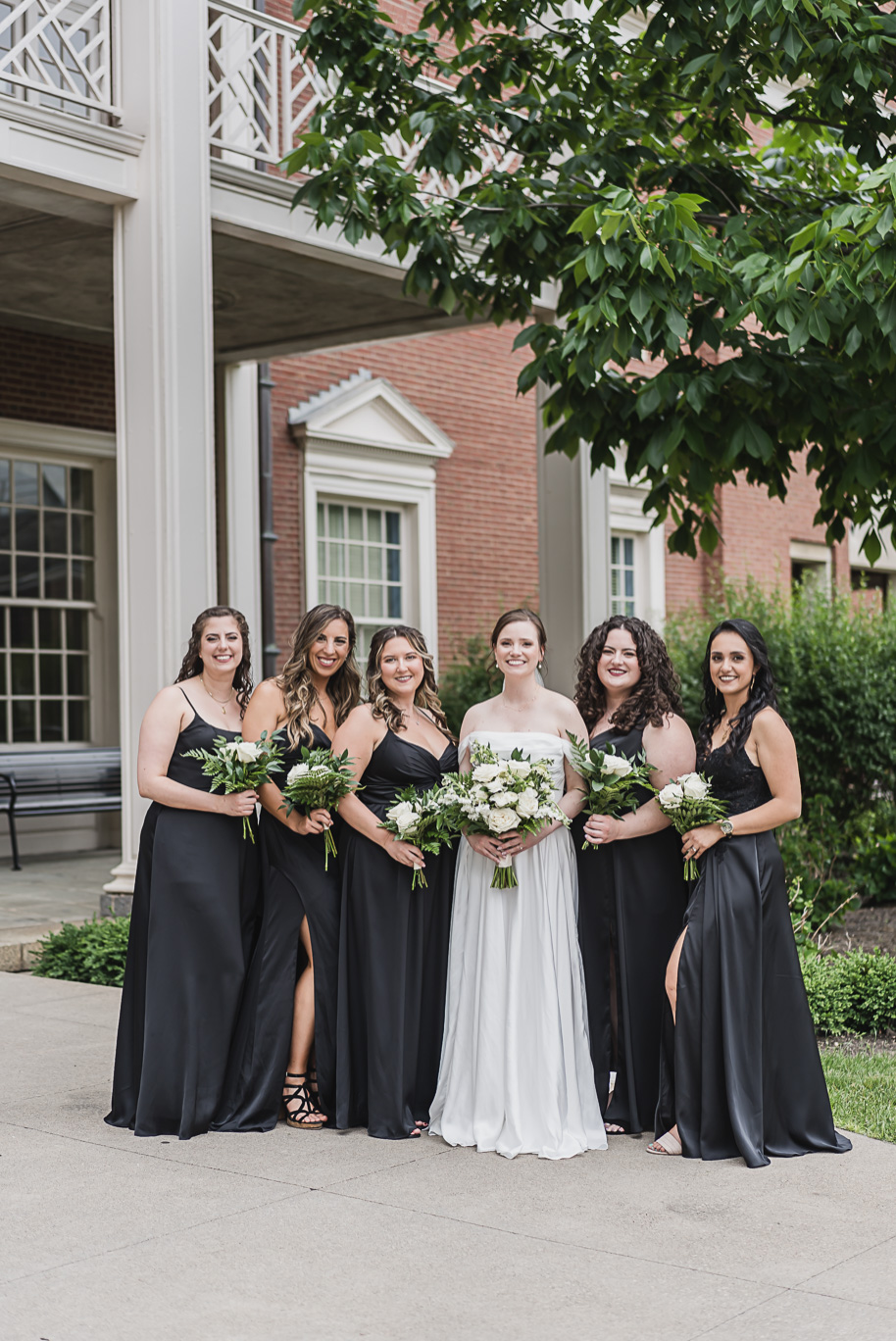 A spring black and white Lovett Hall wedding at Greenfield Village in Dearborn, Michigan provided by Kari Dawson Photography.