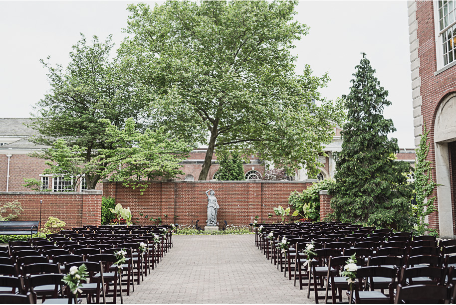 A spring black and white Lovett Hall wedding at Greenfield Village in Dearborn, Michigan provided by Kari Dawson Photography.