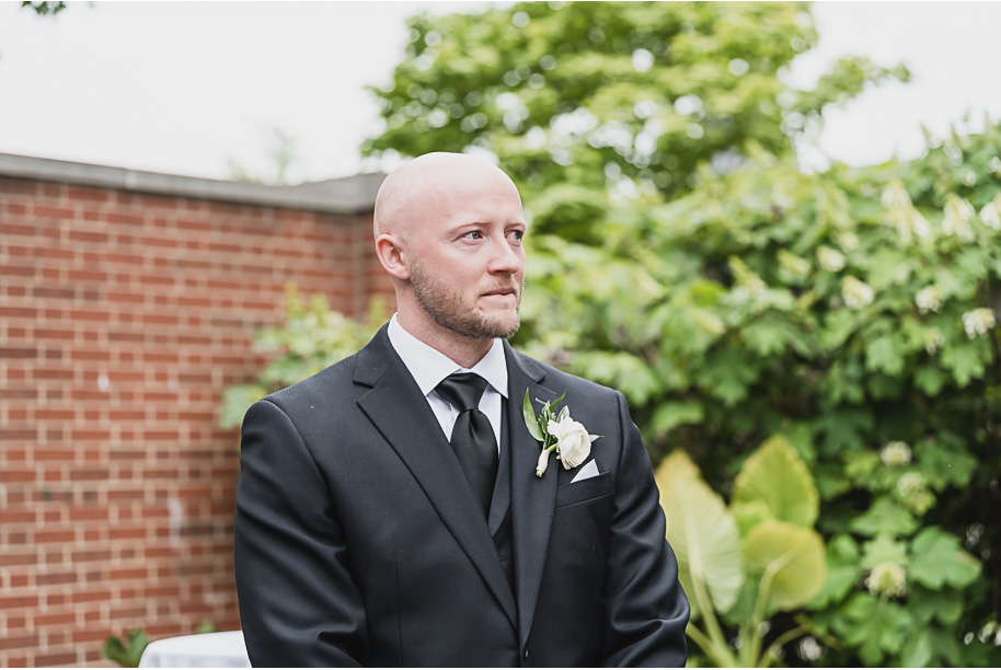 A spring black and white Lovett Hall wedding at Greenfield Village in Dearborn, Michigan provided by Kari Dawson Photography.