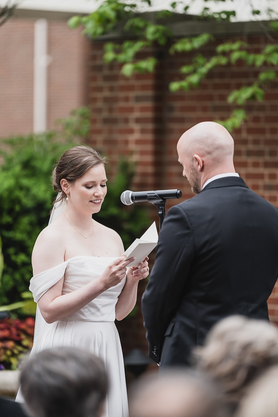 A spring black and white Lovett Hall wedding at Greenfield Village in Dearborn, Michigan provided by Kari Dawson Photography.