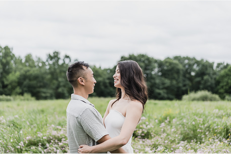 A summer Stony Creek engagement session on the water in Washington, Michigan provided by top-rated Michigan wedding photographer, Kari Dawson.