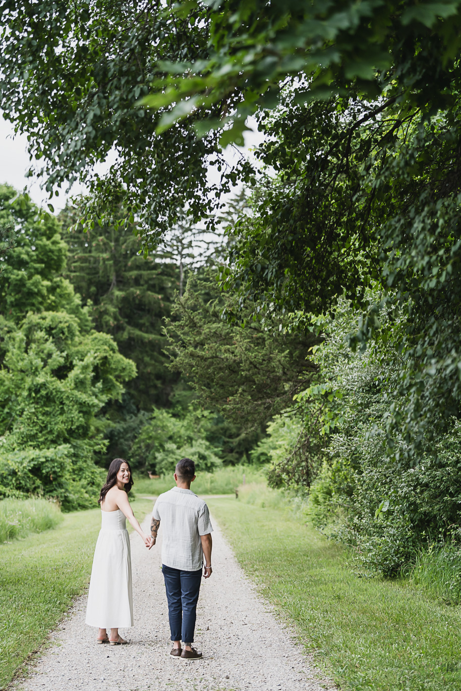 A summer Stony Creek engagement session on the water in Washington, Michigan provided by top-rated Michigan wedding photographer, Kari Dawson.