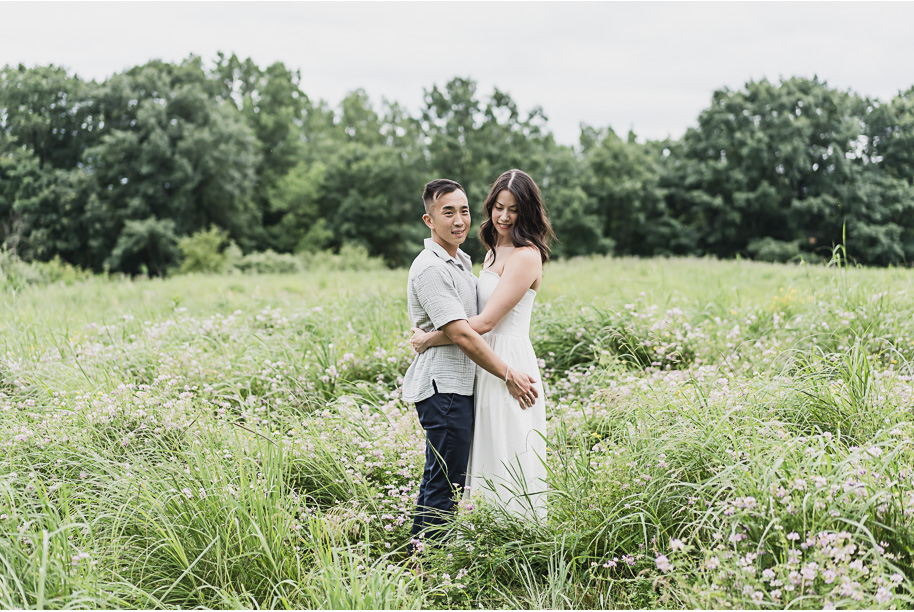 A summer Stony Creek engagement session on the water in Washington, Michigan provided by top-rated Michigan wedding photographer, Kari Dawson.