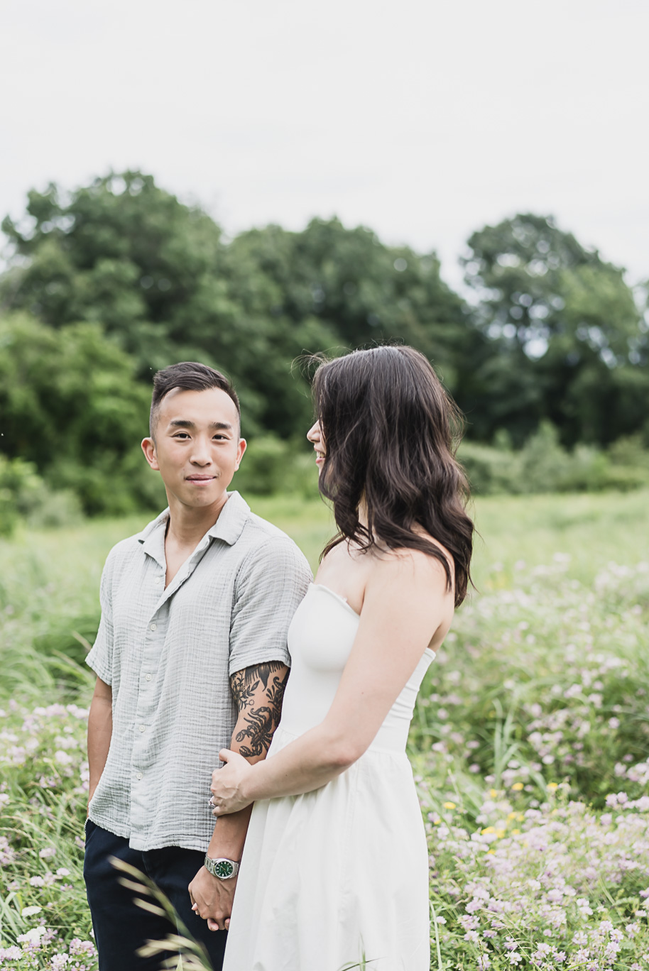 A summer Stony Creek engagement session on the water in Washington, Michigan provided by top-rated Michigan wedding photographer, Kari Dawson.