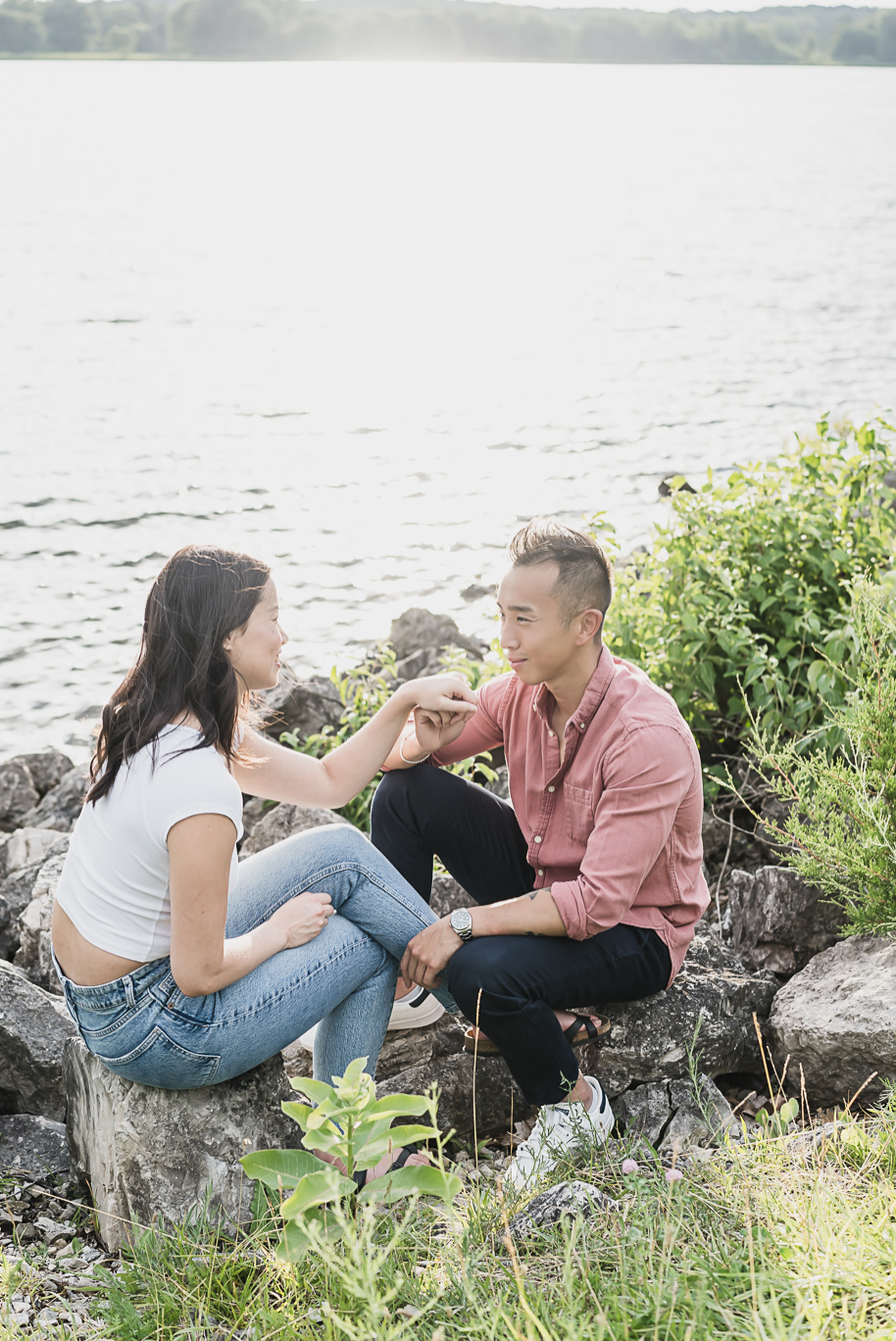 A summer Stony Creek engagement session on the water in Washington, Michigan provided by top-rated Michigan wedding photographer, Kari Dawson.