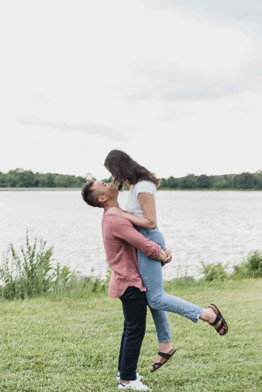 A summer Stony Creek engagement session on the water in Washington, Michigan provided by top-rated Michigan wedding photographer, Kari Dawson.