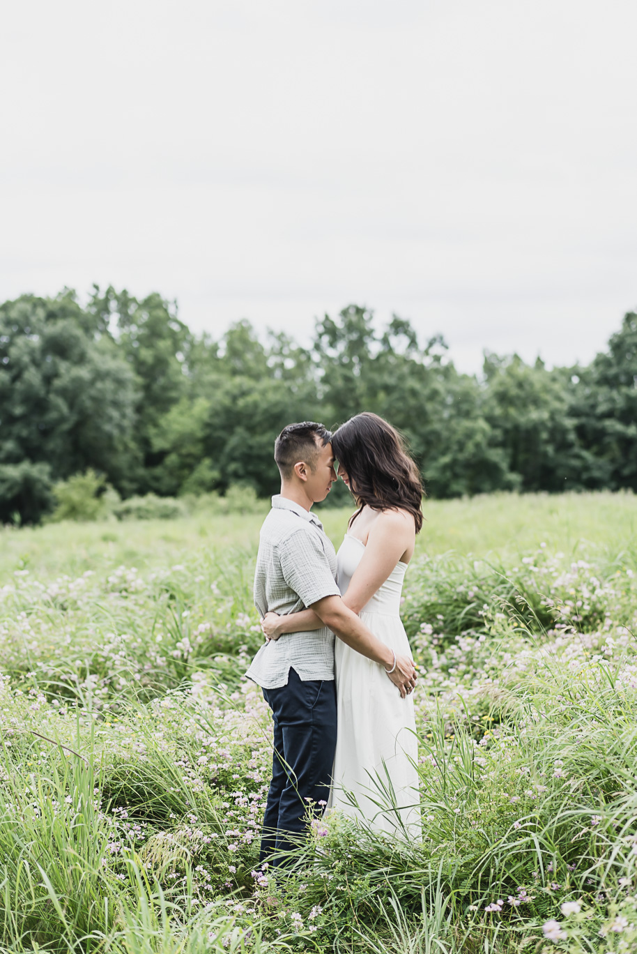 A summer Stony Creek engagement session on the water in Washington, Michigan provided by top-rated Michigan wedding photographer, Kari Dawson.