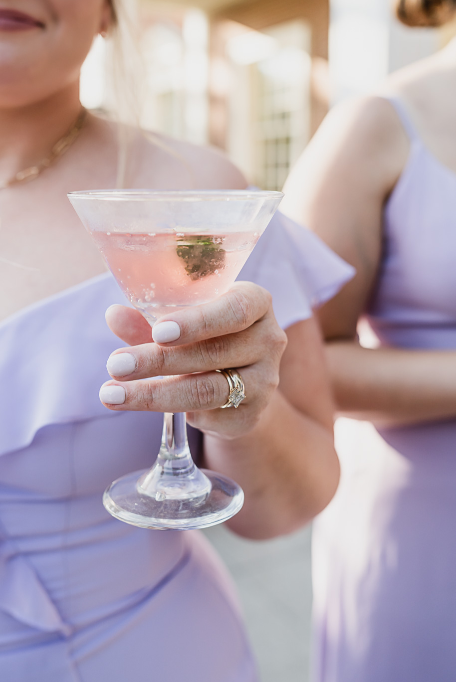 A sunny summer pastel color palette Lovett Hall wedding in Dearborn, Michigan at Greenfield Village provided by Kari Dawson.