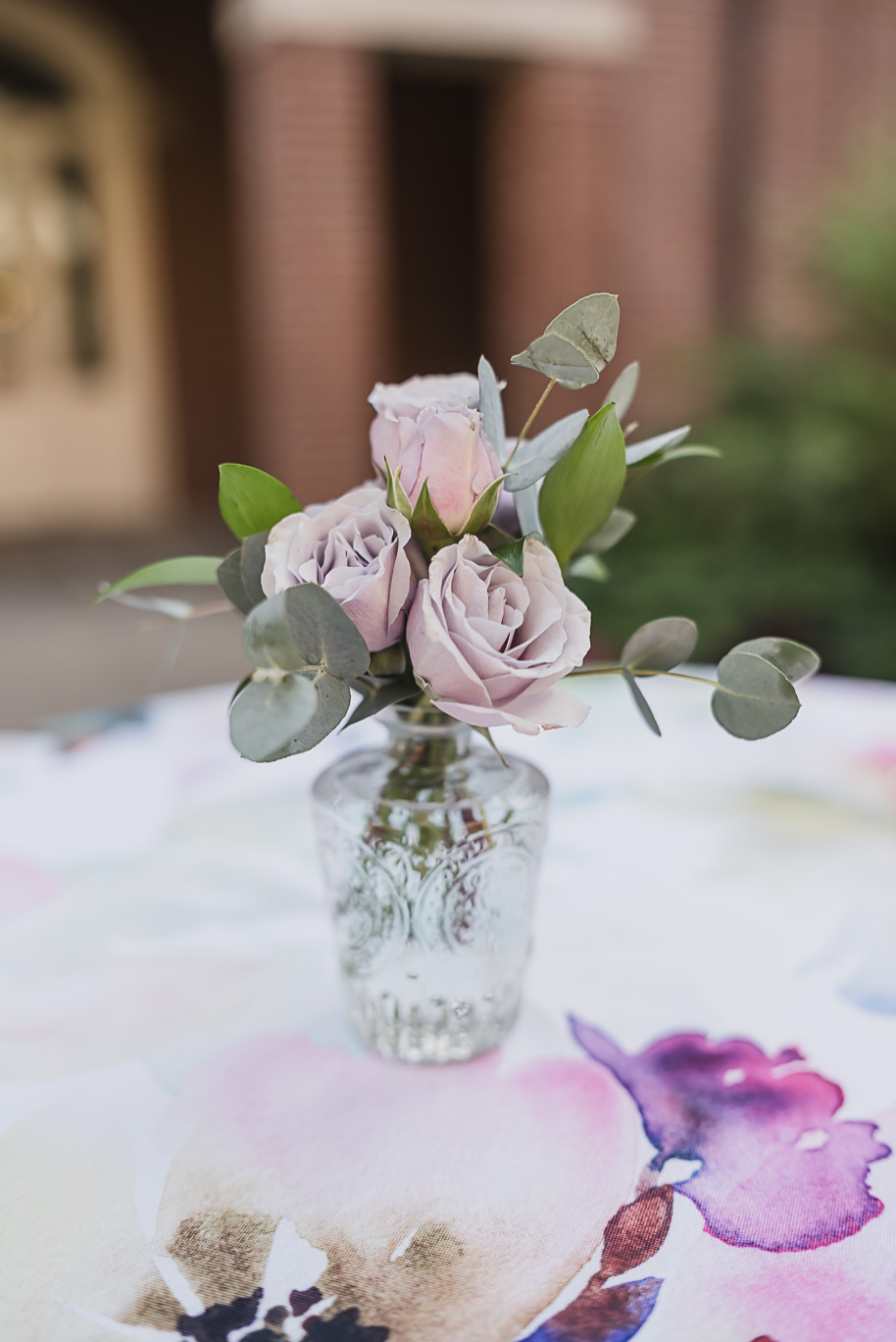 A sunny summer pastel color palette Lovett Hall wedding in Dearborn, Michigan at Greenfield Village provided by Kari Dawson.