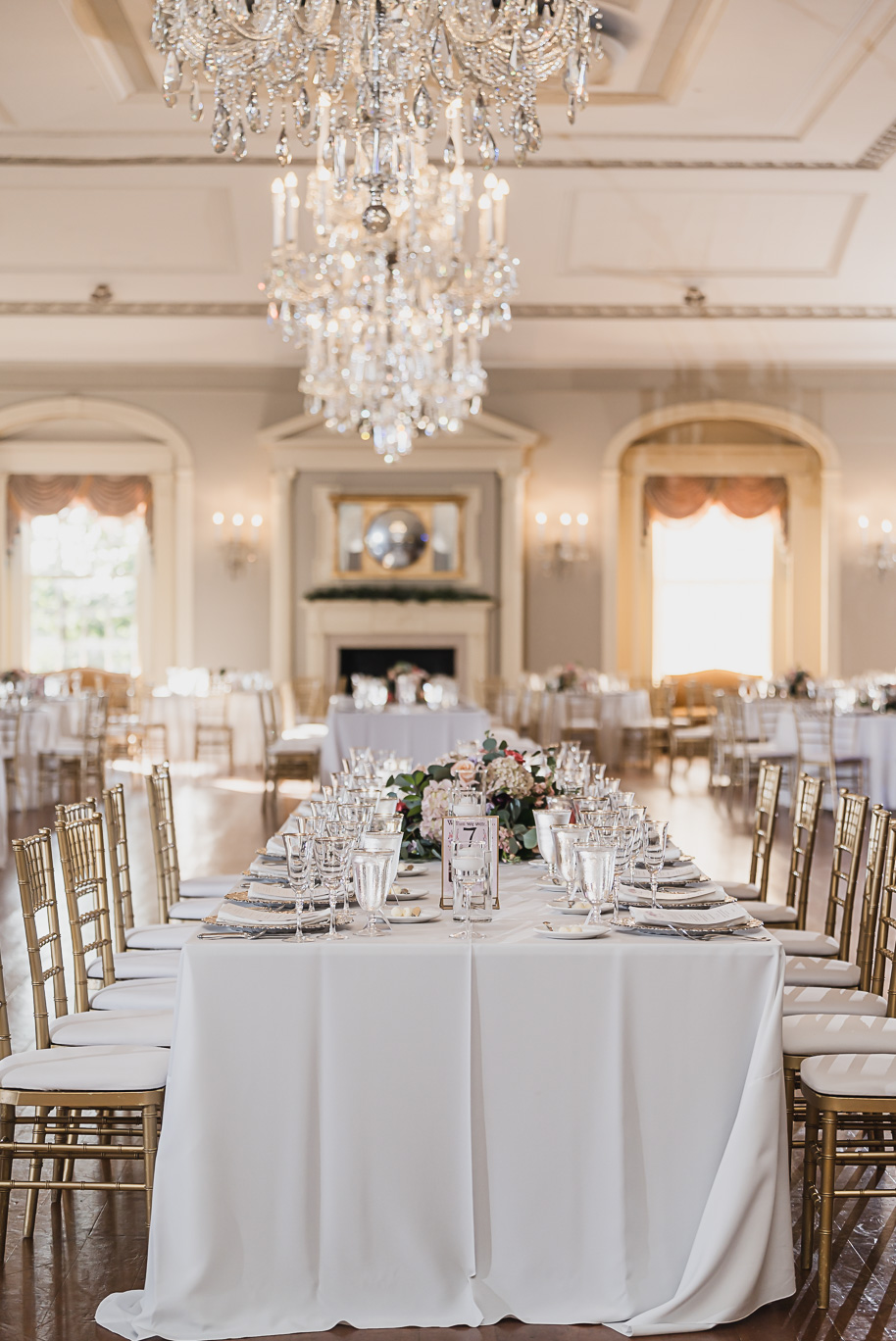 A sunny summer pastel color palette Lovett Hall wedding in Dearborn, Michigan at Greenfield Village provided by Kari Dawson.