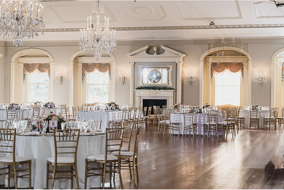 A sunny summer pastel color palette Lovett Hall wedding in Dearborn, Michigan at Greenfield Village provided by Kari Dawson.