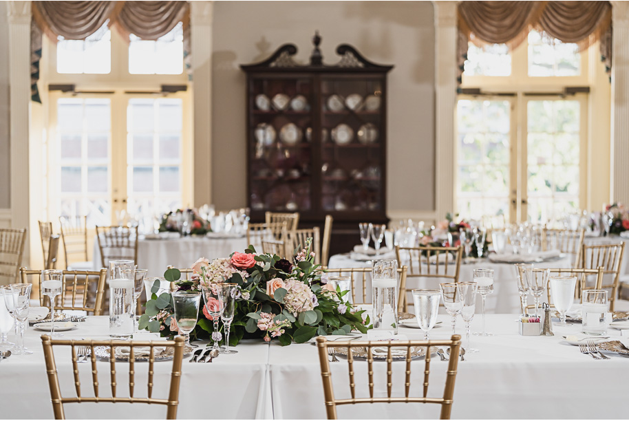 A sunny summer pastel color palette Lovett Hall wedding in Dearborn, Michigan at Greenfield Village provided by Kari Dawson.