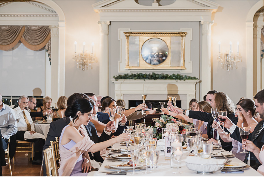 A sunny summer pastel color palette Lovett Hall wedding in Dearborn, Michigan at Greenfield Village provided by Kari Dawson.