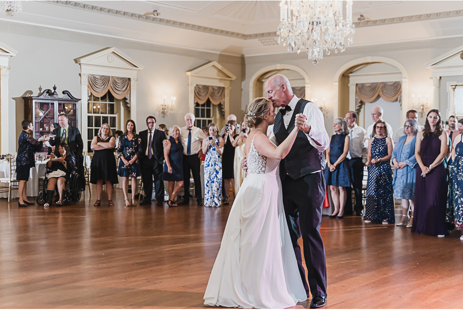 A sunny summer pastel color palette Lovett Hall wedding in Dearborn, Michigan at Greenfield Village provided by Kari Dawson.