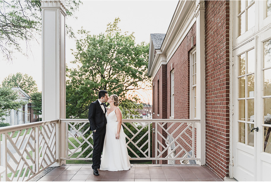 A sunny summer pastel color palette Lovett Hall wedding in Dearborn, Michigan at Greenfield Village provided by Kari Dawson.