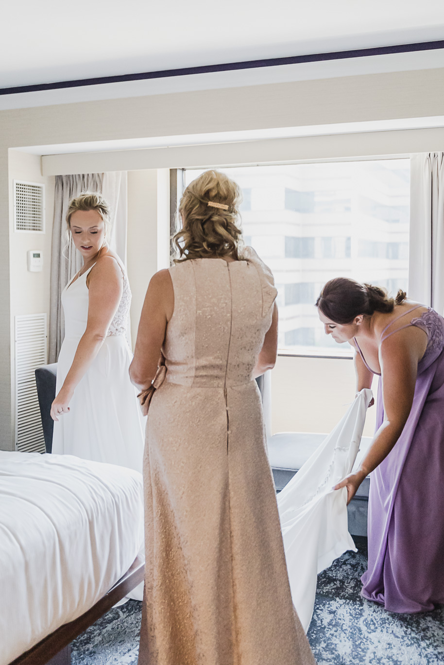 A sunny summer pastel color palette Lovett Hall wedding in Dearborn, Michigan at Greenfield Village provided by Kari Dawson.