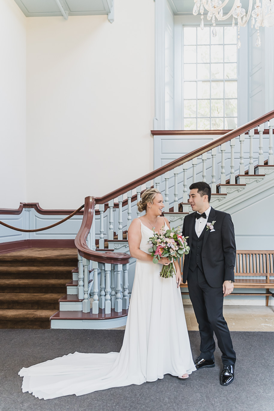 A sunny summer pastel color palette Lovett Hall wedding in Dearborn, Michigan at Greenfield Village provided by Kari Dawson.