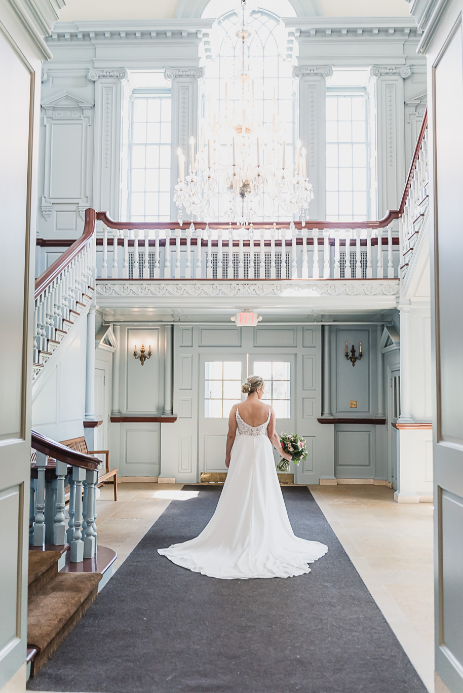 A sunny summer pastel color palette Lovett Hall wedding in Dearborn, Michigan at Greenfield Village provided by Kari Dawson.