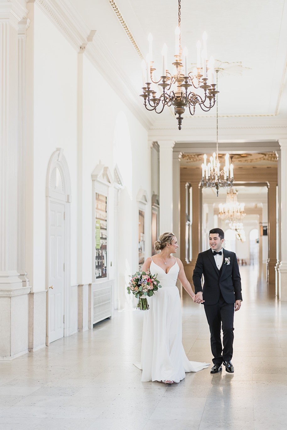 A sunny summer pastel color palette Lovett Hall wedding in Dearborn, Michigan at Greenfield Village provided by Kari Dawson.