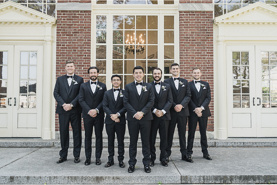 A sunny summer pastel color palette Lovett Hall wedding in Dearborn, Michigan at Greenfield Village provided by Kari Dawson.