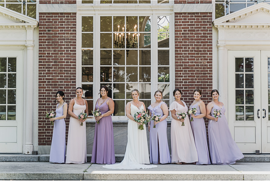 A sunny summer pastel color palette Lovett Hall wedding in Dearborn, Michigan at Greenfield Village provided by Kari Dawson.