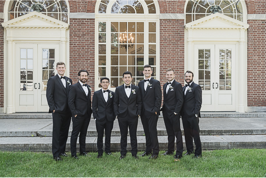 A sunny summer pastel color palette Lovett Hall wedding in Dearborn, Michigan at Greenfield Village provided by Kari Dawson.