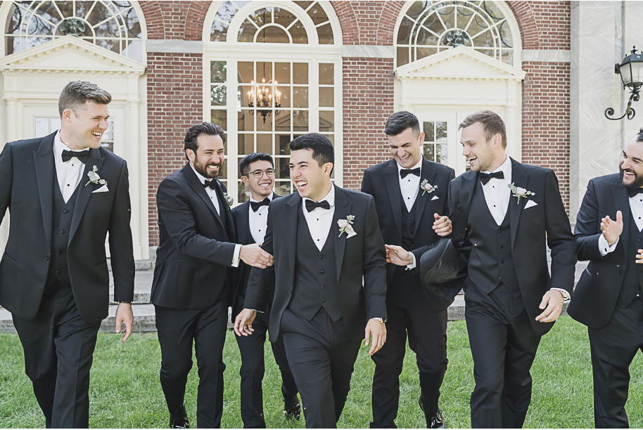 A sunny summer pastel color palette Lovett Hall wedding in Dearborn, Michigan at Greenfield Village provided by Kari Dawson.