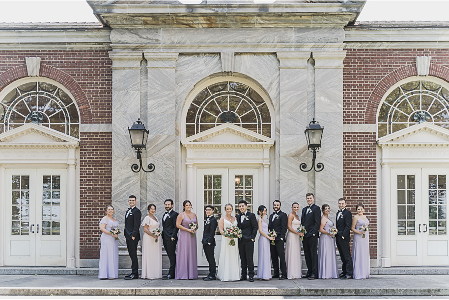 A sunny summer pastel color palette Lovett Hall wedding in Dearborn, Michigan at Greenfield Village provided by Kari Dawson.