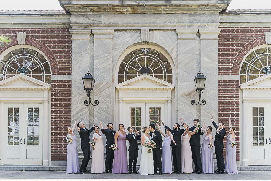 A sunny summer pastel color palette Lovett Hall wedding in Dearborn, Michigan at Greenfield Village provided by Kari Dawson.