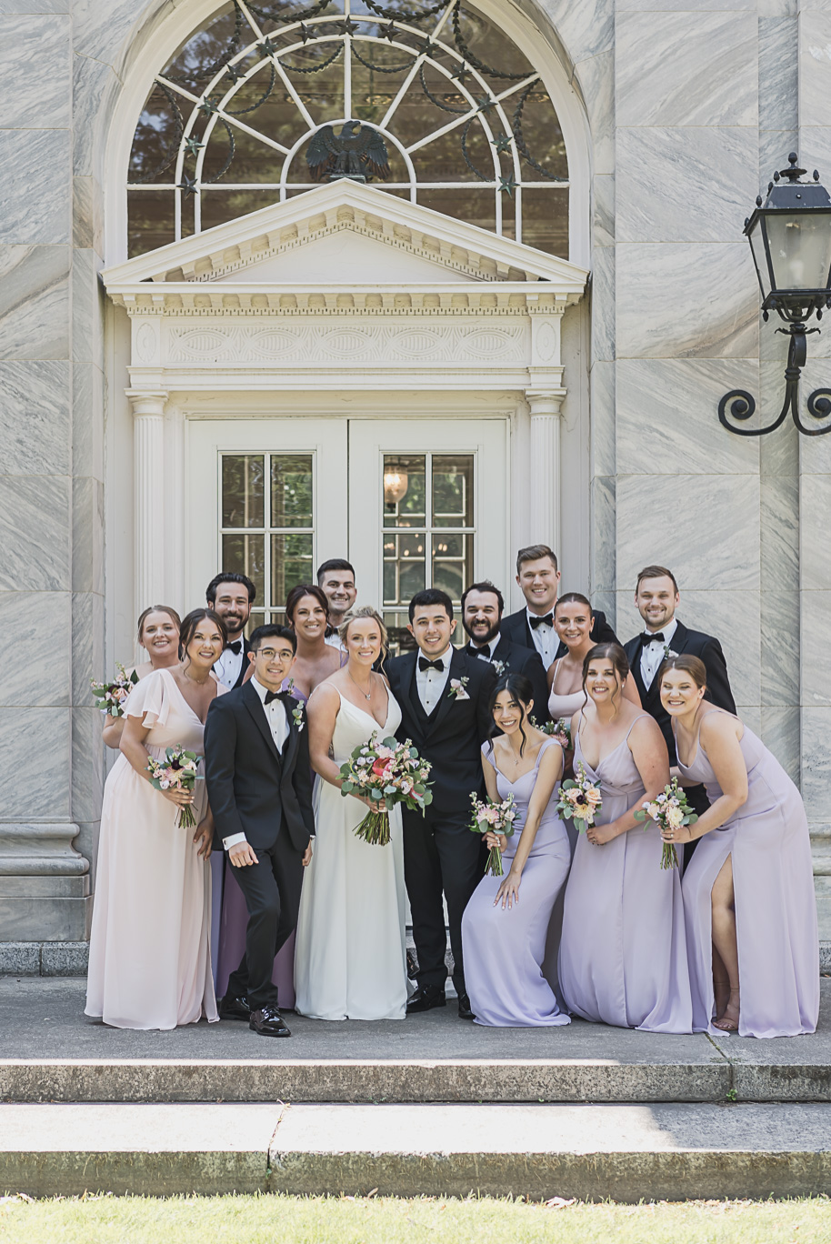 A sunny summer pastel color palette Lovett Hall wedding in Dearborn, Michigan at Greenfield Village provided by Kari Dawson.