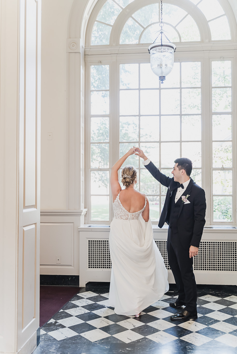 A sunny summer pastel color palette Lovett Hall wedding in Dearborn, Michigan at Greenfield Village provided by Kari Dawson.