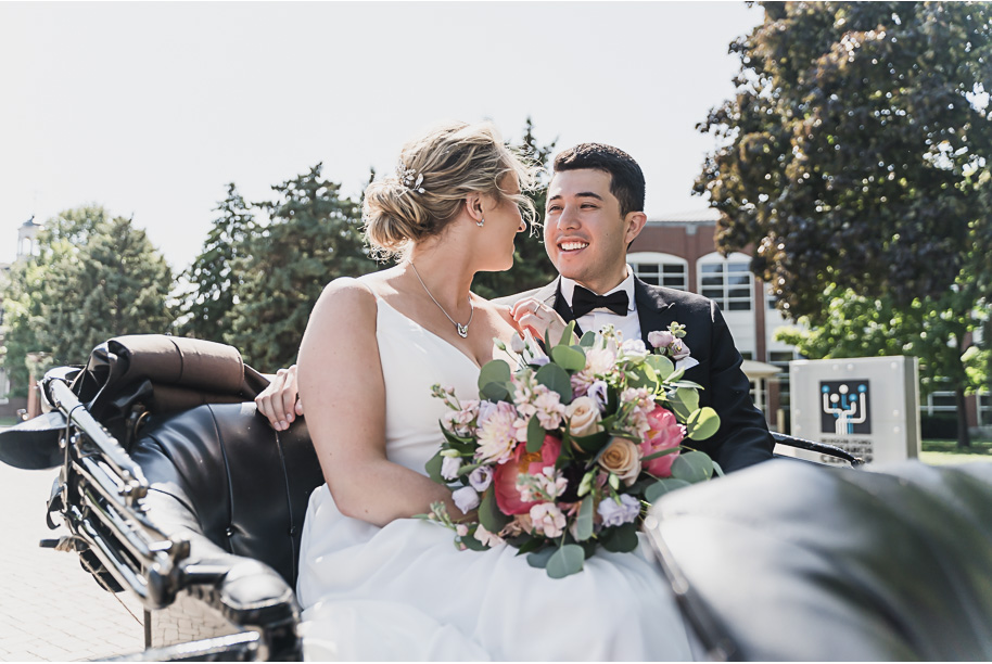 A sunny summer pastel color palette Lovett Hall wedding in Dearborn, Michigan at Greenfield Village provided by Kari Dawson.