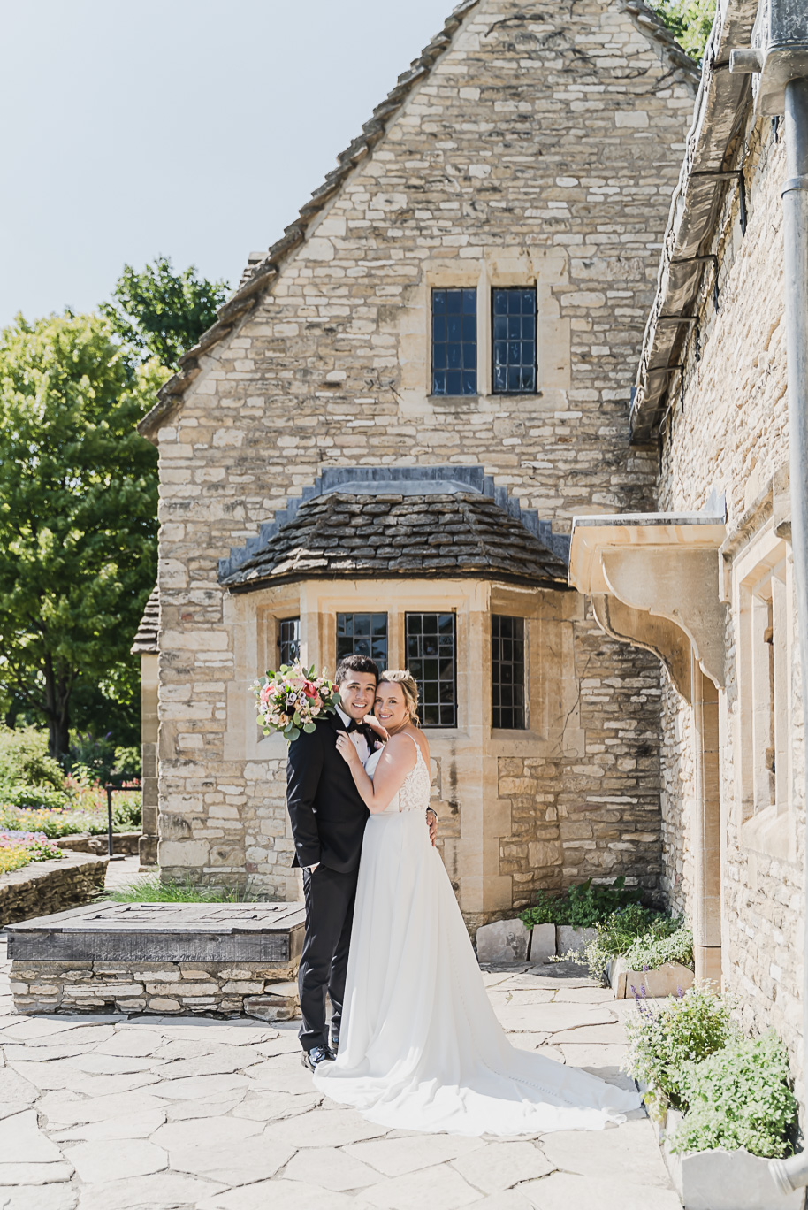 A sunny summer pastel color palette Lovett Hall wedding in Dearborn, Michigan at Greenfield Village provided by Kari Dawson.