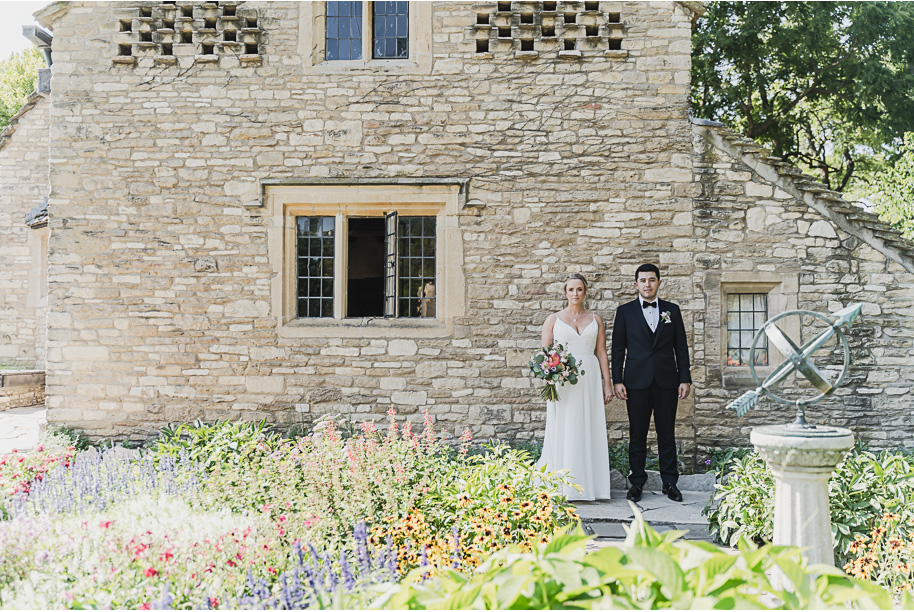 A sunny summer pastel color palette Lovett Hall wedding in Dearborn, Michigan at Greenfield Village provided by Kari Dawson.