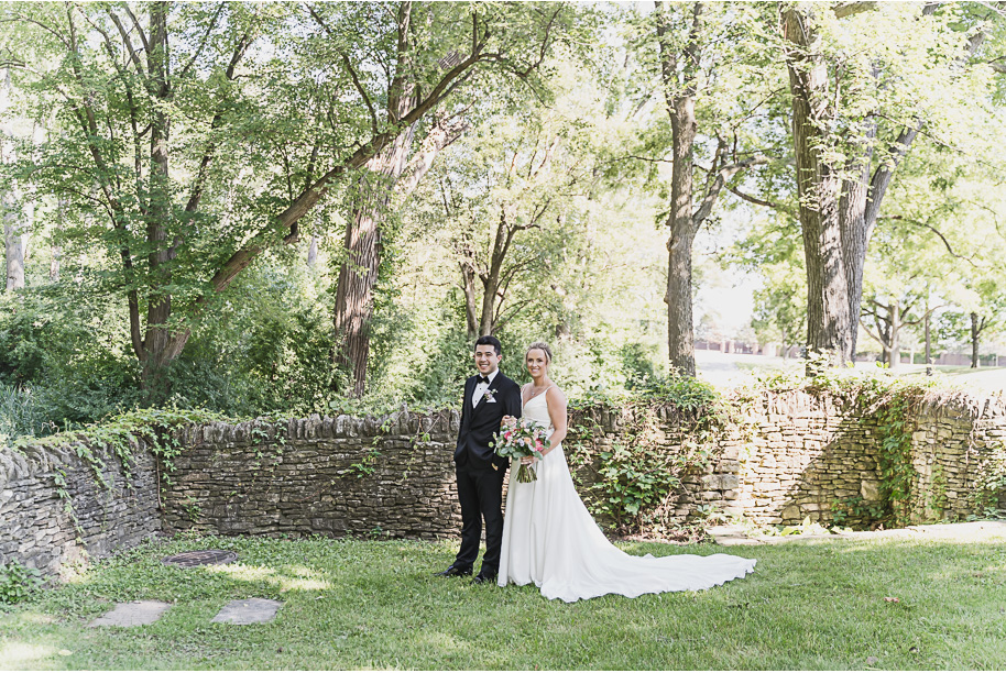 A sunny summer pastel color palette Lovett Hall wedding in Dearborn, Michigan at Greenfield Village provided by Kari Dawson.