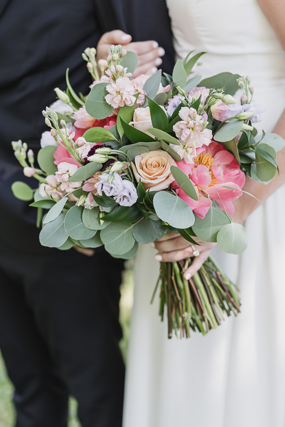 A sunny summer pastel color palette Lovett Hall wedding in Dearborn, Michigan at Greenfield Village provided by Kari Dawson.