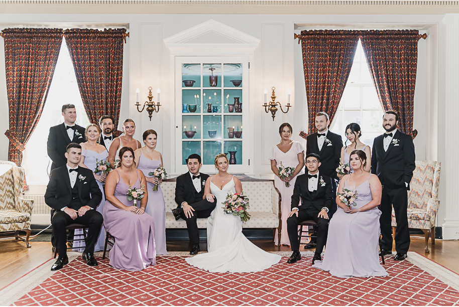 A sunny summer pastel color palette Lovett Hall wedding in Dearborn, Michigan at Greenfield Village provided by Kari Dawson.