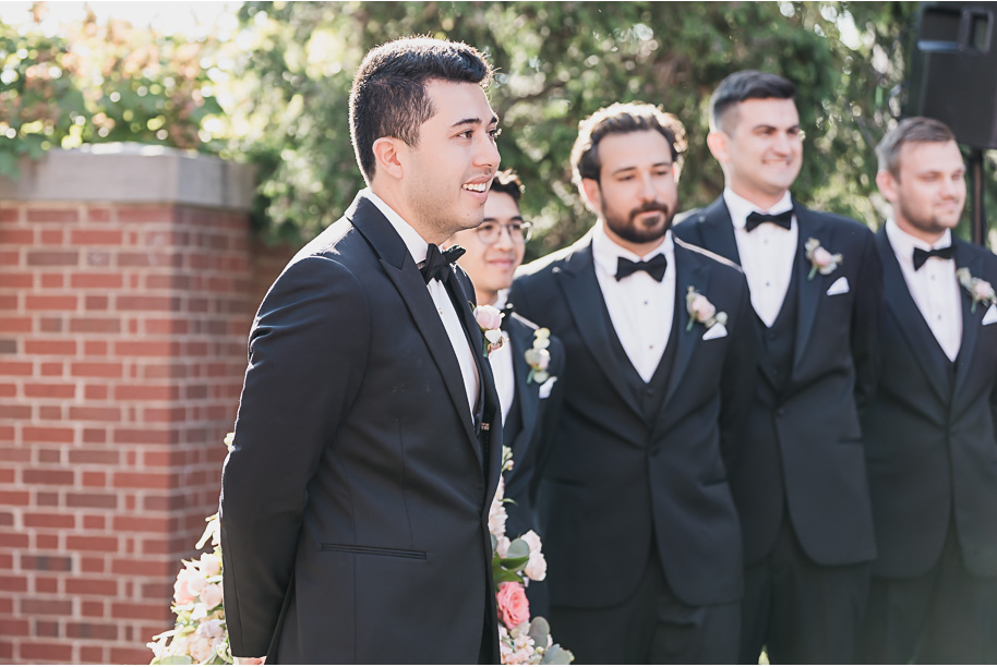 A sunny summer pastel color palette Lovett Hall wedding in Dearborn, Michigan at Greenfield Village provided by Kari Dawson.