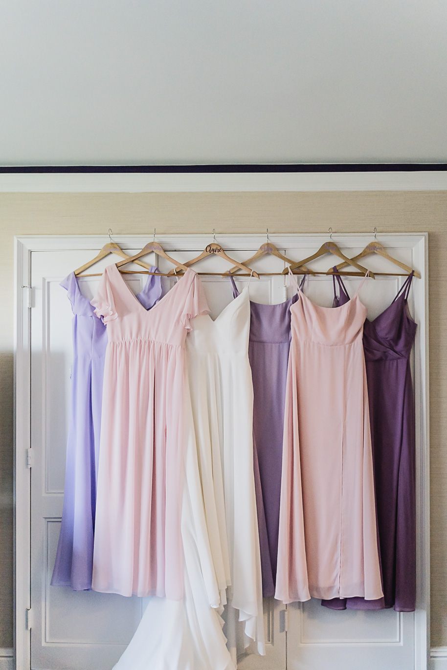 A sunny summer pastel color palette Lovett Hall wedding in Dearborn, Michigan at Greenfield Village provided by Kari Dawson.