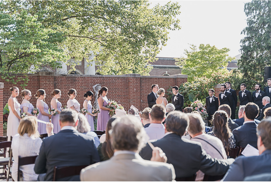 A sunny summer pastel color palette Lovett Hall wedding in Dearborn, Michigan at Greenfield Village provided by Kari Dawson.