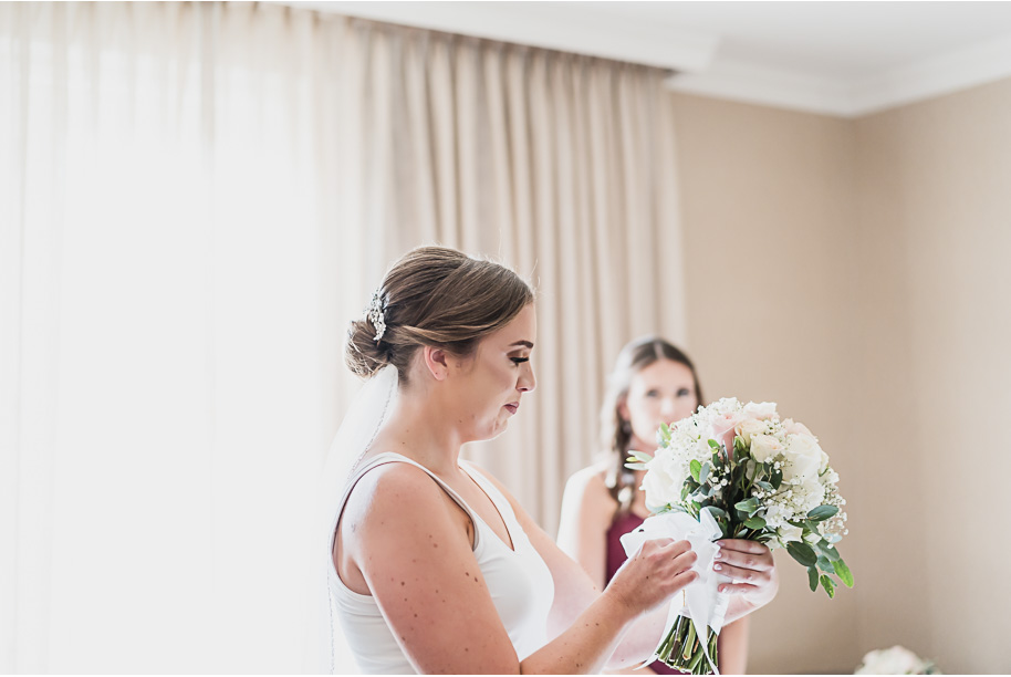 A romantic late summer intimate wedding at the Royal Park Hotel in Rochester, Michigan provided by top-rated Rochester wedding photograher Kari Dawson and her team.