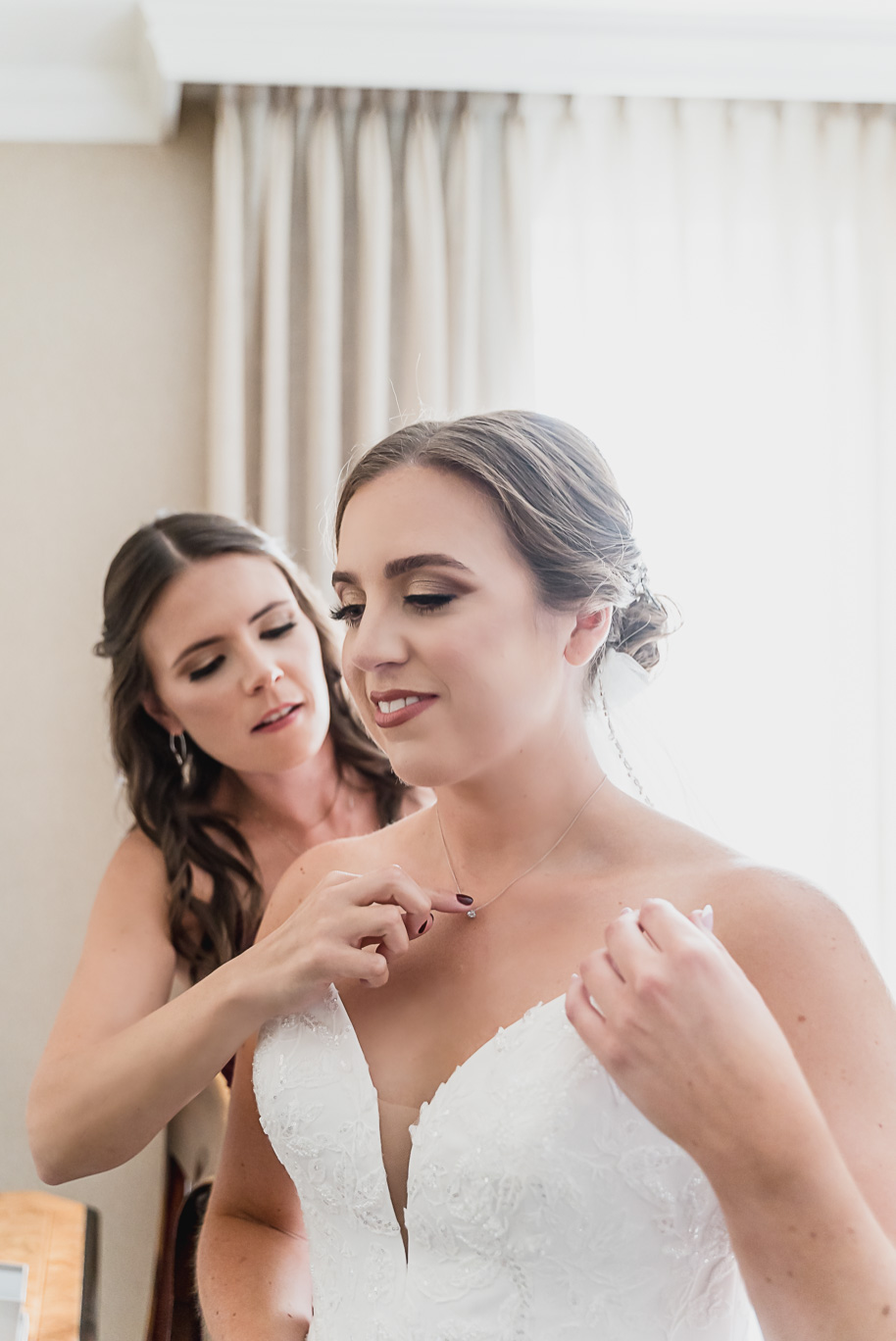 A romantic late summer intimate wedding at the Royal Park Hotel in Rochester, Michigan provided by top-rated Rochester wedding photograher Kari Dawson and her team.