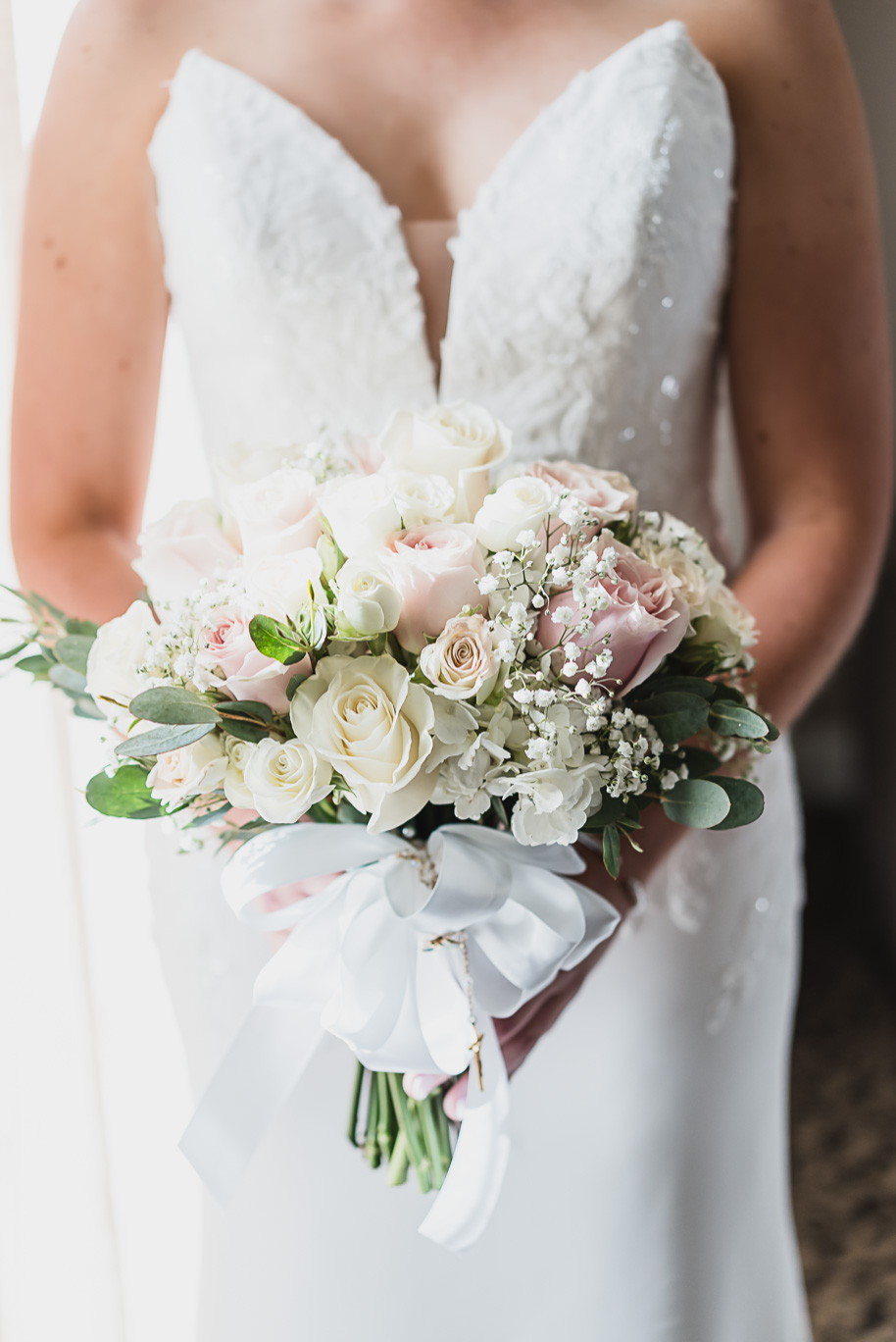 A romantic late summer intimate wedding at the Royal Park Hotel in Rochester, Michigan provided by top-rated Rochester wedding photograher Kari Dawson and her team.