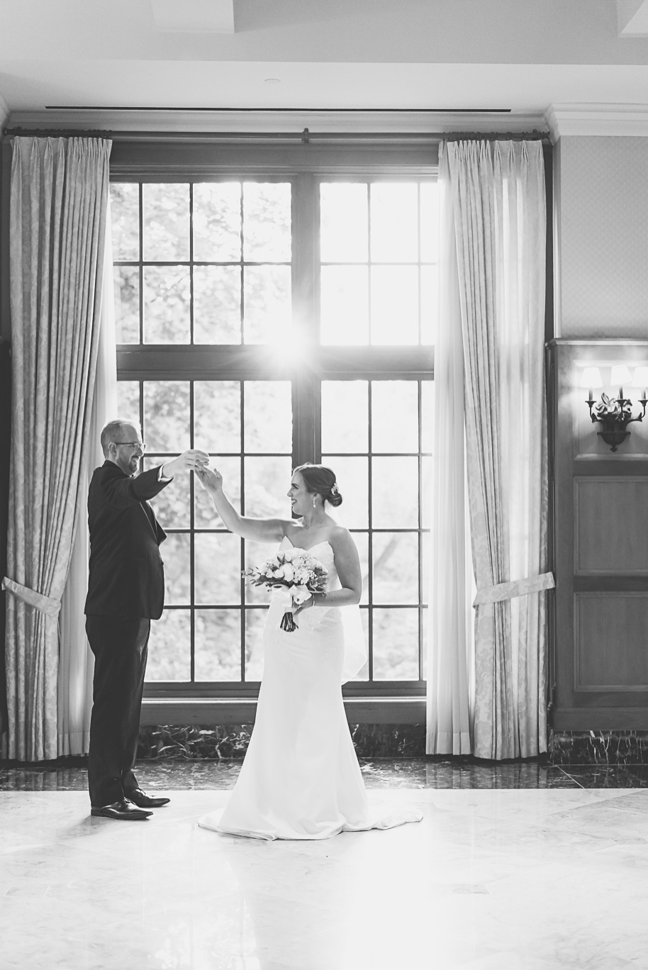 A romantic late summer intimate wedding at the Royal Park Hotel in Rochester, Michigan provided by top-rated Rochester wedding photograher Kari Dawson and her team.