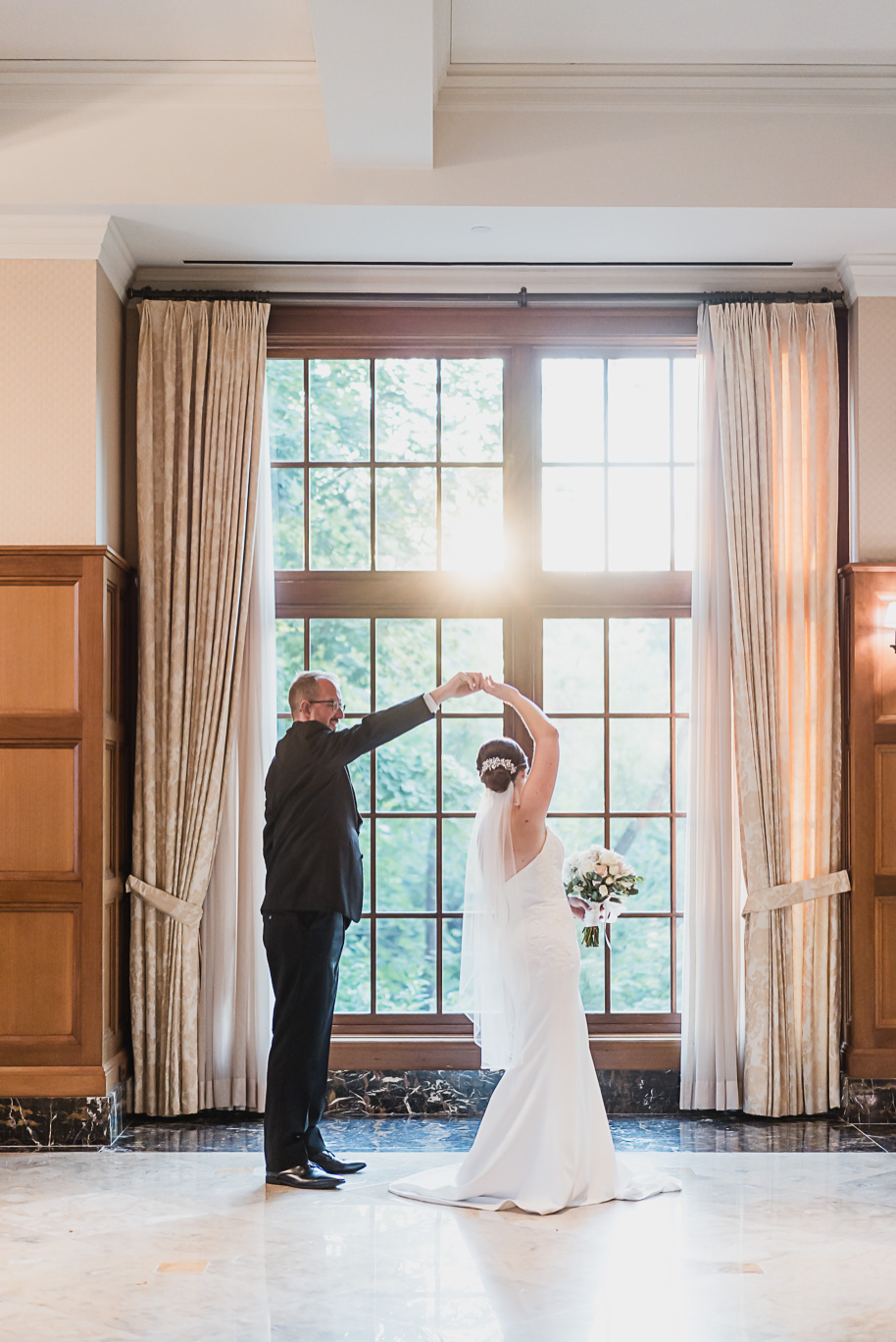 A romantic late summer intimate wedding at the Royal Park Hotel in Rochester, Michigan provided by top-rated Rochester wedding photograher Kari Dawson and her team.