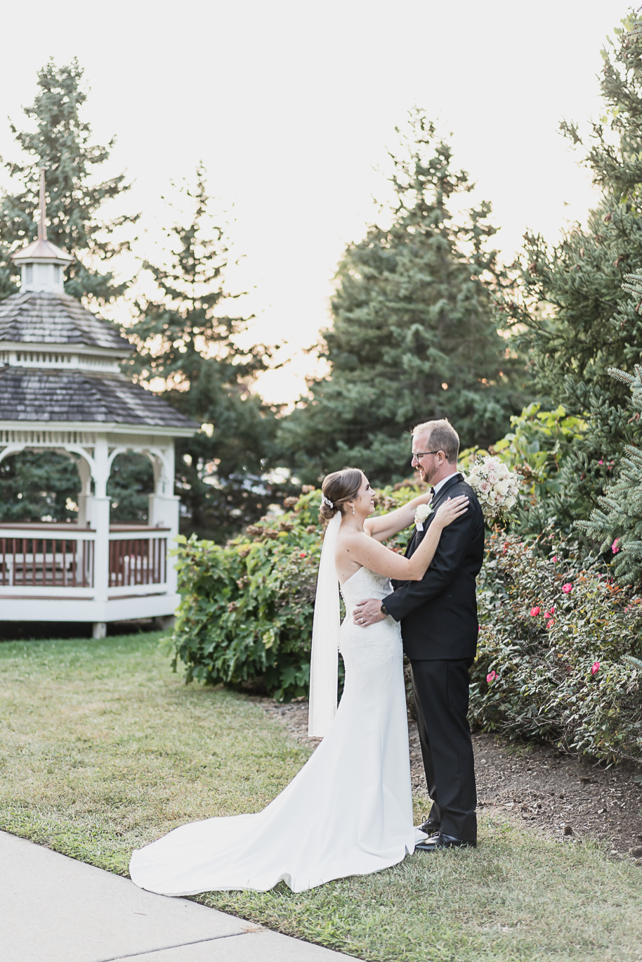 A romantic late summer intimate wedding at the Royal Park Hotel in Rochester, Michigan provided by top-rated Rochester wedding photograher Kari Dawson and her team.