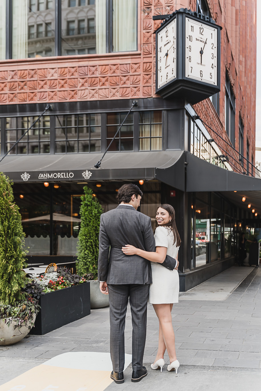 A classicly styled romantic downtown Detroit engagement session provided by top-rated Detroit wedding photographer Kari Dawson.