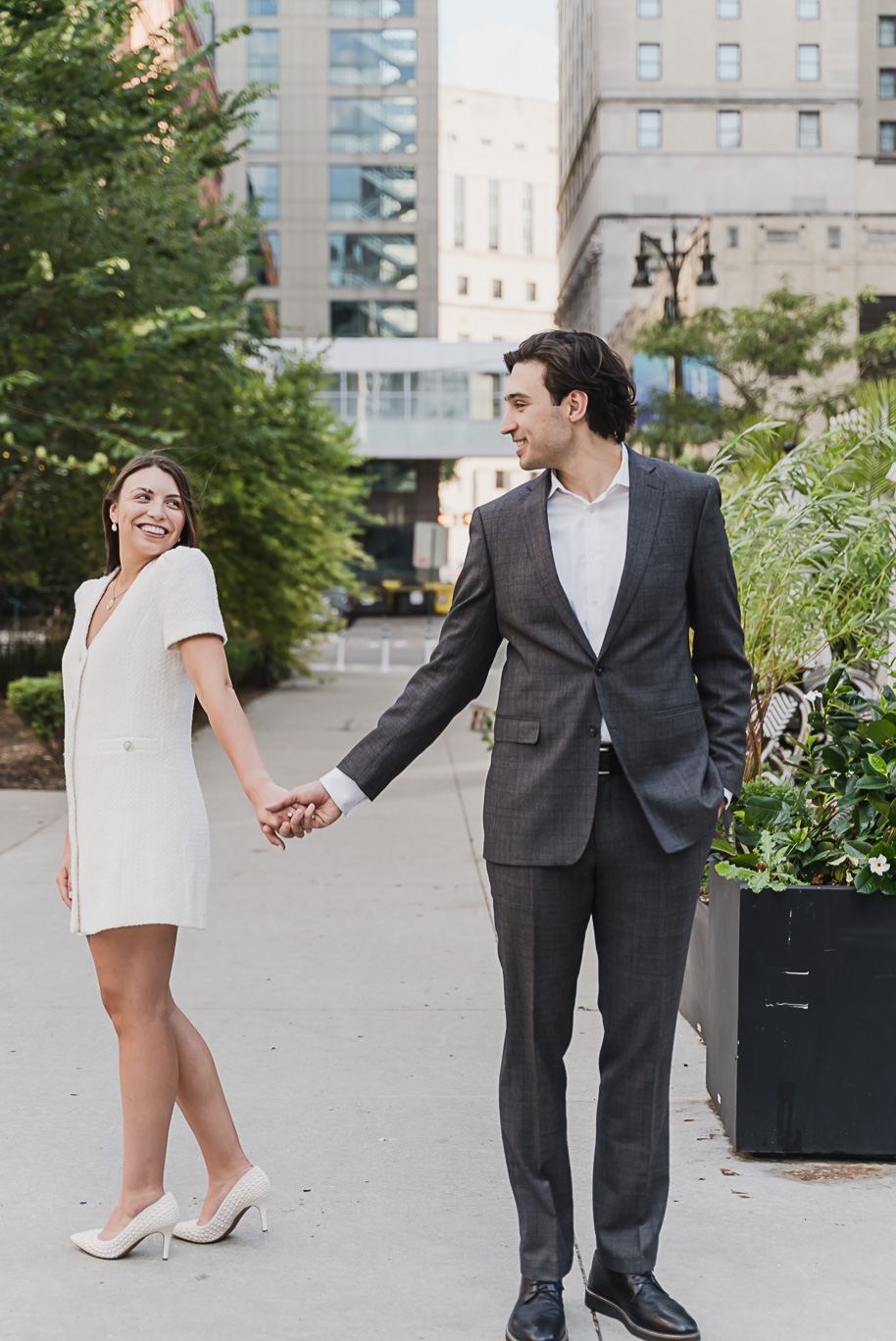 A classicly styled romantic downtown Detroit engagement session provided by top-rated Detroit wedding photographer Kari Dawson.