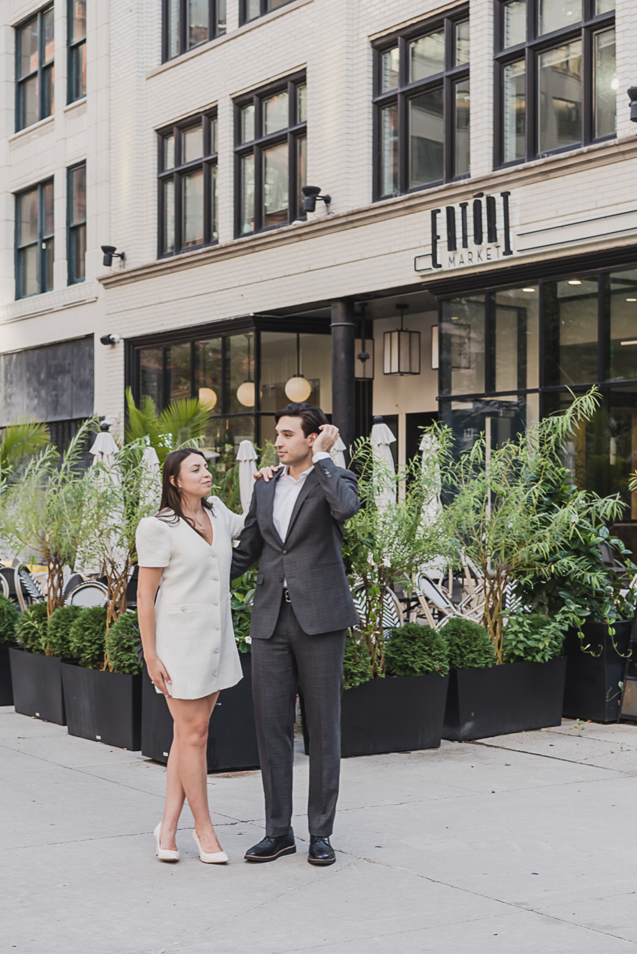 A classicly styled romantic downtown Detroit engagement session provided by top-rated Detroit wedding photographer Kari Dawson.